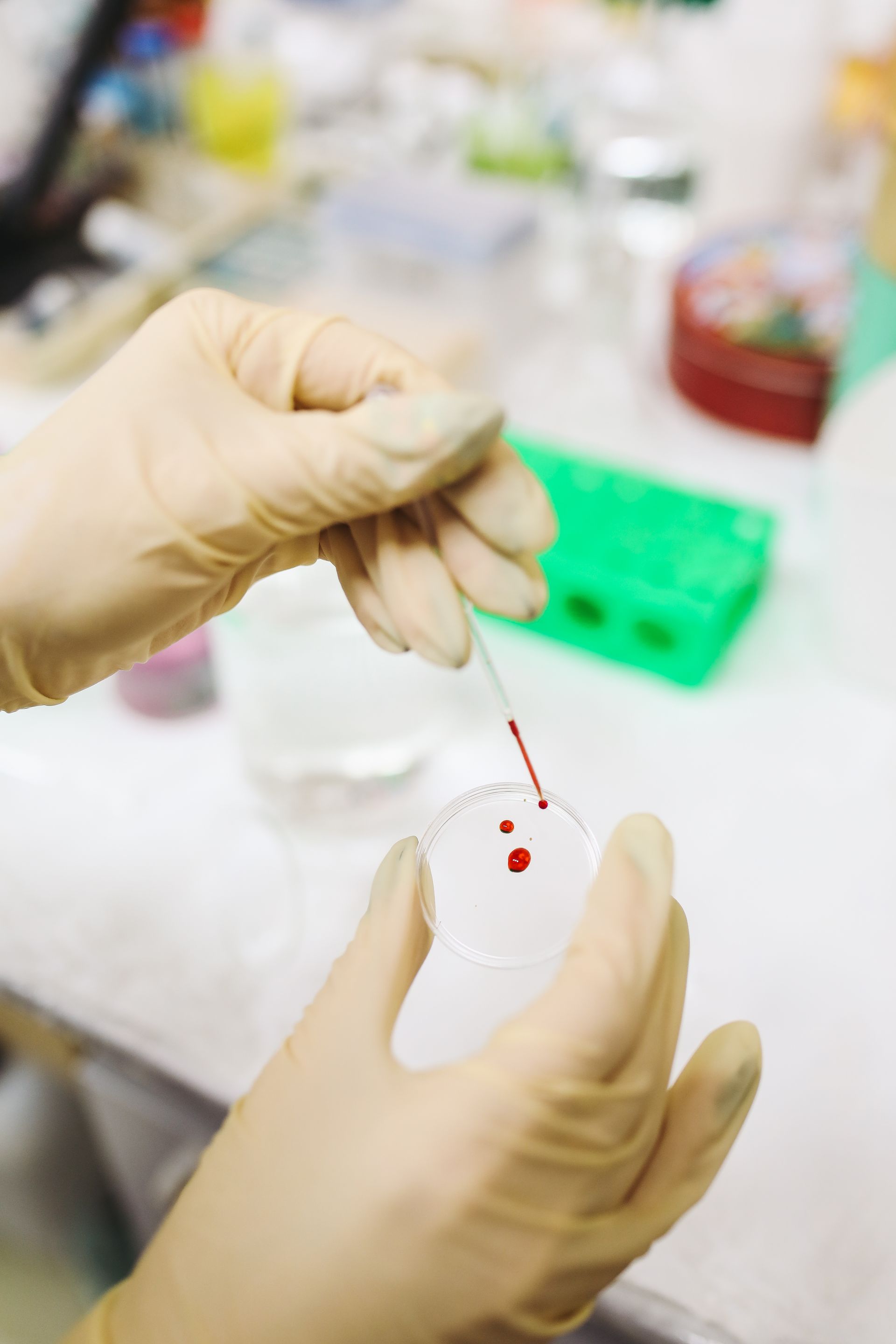 Researcher analyzing a sample in a laboratory